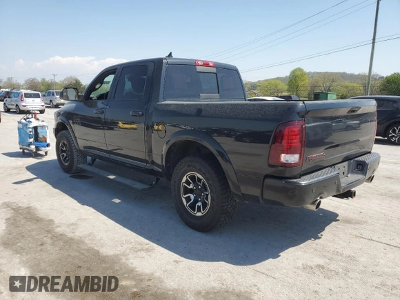 2016 Ram 1500 Rebel z VIN 1C6RR7YT1GS350439, wystawiony jako Copart lot #52300885 z przebiegiem 196 557 mil mil oraz Szkody całkowita. Historia ofert i sprzedaży dostępna na DreamBid. Obrazek 2.