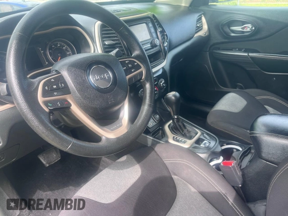 2015 Jeep Cherokee Sport z VIN 1C4PJLAB8FW632067, wystawiony jako Copart lot #63940525 z przebiegiem 119 064 mil mil oraz Czysty tytuł • Clean title. Historia ofert i sprzedaży dostępna na DreamBid. Obrazek 9.