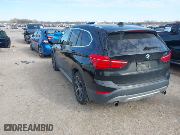 2016 BMW X1 xDrive28i with VIN WBXHT3Z3XG4A48557, listed as a IAAI auction lot 41387960 with 84,821 mi miles. Bid and sale history available at carsss.com. Image 3.