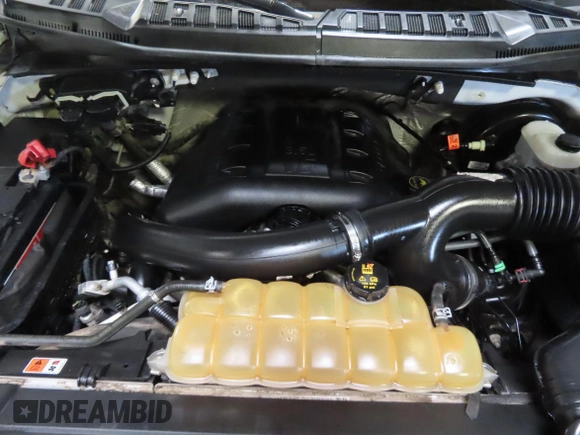 2015 Ford F-150 XL with VIN 1FTEW1CG0FKD61342, listed as a Copart auction lot 60142545 with 113,798 mi miles and Salvage title. Bid and sale history available at DreamBid. Image 7.