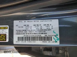 2009 Mazda 3 S Touring with VIN JM1BK344591250908, listed as a Copart auction lot 60690215 with 164,063 mi miles and Salvage title. Bid and sale history available at DreamBid. Image 12.