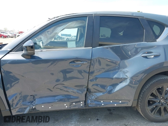 2023 Mazda CX-5 2.5 S Preferred Package with VIN JM3KFBCM8P0260150, listed as a IAAI auction lot 41827533 with 19,318 mi miles. Bid and sale history available at carsss.com. Image 13.