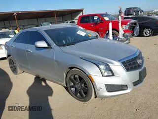 2013 Cadillac ATS z VIN 1G6AA5RAXD0144075, wystawiony jako IAAI lot #41792188 z przebiegiem 184 028 mil mil oraz . Historia ofert i sprzedaży dostępna na DreamBid. Obrazek 1.