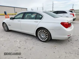 2012 BMW 7 Series 750Li xDrive with VIN WBAKC8C5XCC436134, listed as a Copart auction lot 63144905 with 64,282 mi miles and Salvage title. Bid and sale history available at DreamBid. Image 2.