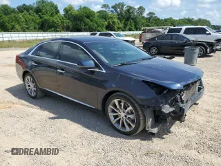 2015 Cadillac XTS Luxury z VIN 2G61M5S32F9169354, wystawiony jako Copart lot #54887215 z przebiegiem 138 795 mil mil oraz Szkoda całkowita • Salvage title. Historia ofert i sprzedaży dostępna na DreamBid. Obrazek 4.