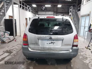 2003 Mazda Tribute DX with VIN 4F2YZ02B73KM43813, listed as a IAAI auction lot 41575708 with 202,214 mi miles and . Bid and sale history available at carsss.com. Image 16.