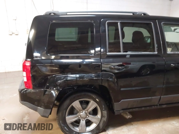 2014 Jeep Patriot High Altitude with VIN 1C4NJPFAXED679271, listed as a IAAI auction lot 41290600 with 157,256 mi miles and . Bid and sale history available at carsss.com. Image 6.