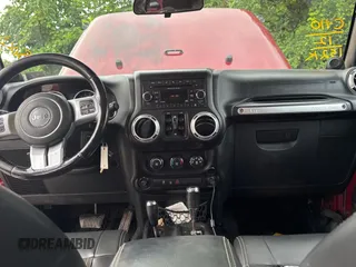 2012 Jeep Wrangler Unlimited Sport with VIN 1C4BJWDG5CL289329, listed as a Copart auction lot 65816775 with 152,632 mi miles and Clean title. Bid and sale history available at DreamBid. Image 9.