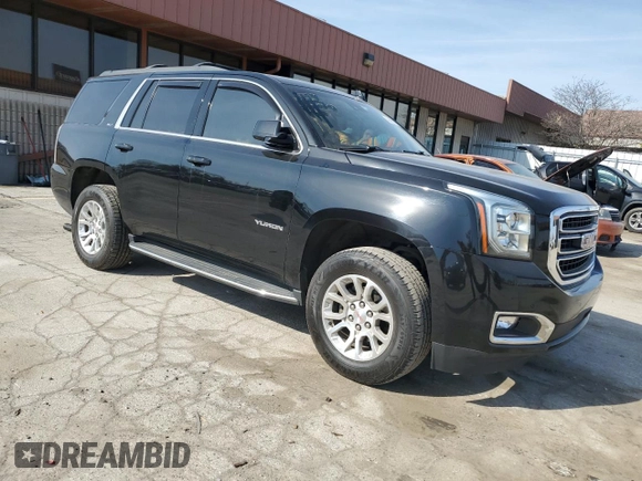 2017 GMC Yukon SLT with VIN 1GKS2BKC1HR217445, listed as a Copart auction lot 48499215 with 104,526 mi miles and Salvage Title. Bid and sale history available at carsss.com. Image 4.