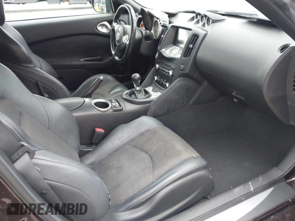 2010 Nissan 370Z Touring with VIN JN1AZ4FH3AM301311, listed as a IAAI auction lot 41976379 with 51,347 mi miles. Bid and sale history available at carsss.com. Image 5.