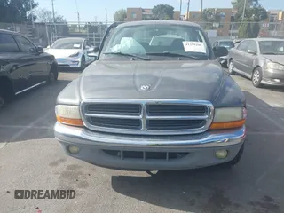 2003 Dodge Dakota SLT with VIN 1D7HL48N23S247441, listed as a IAAI auction lot 41359296 with 58,414 mi miles. Bid and sale history available at carsss.com. Image 12.