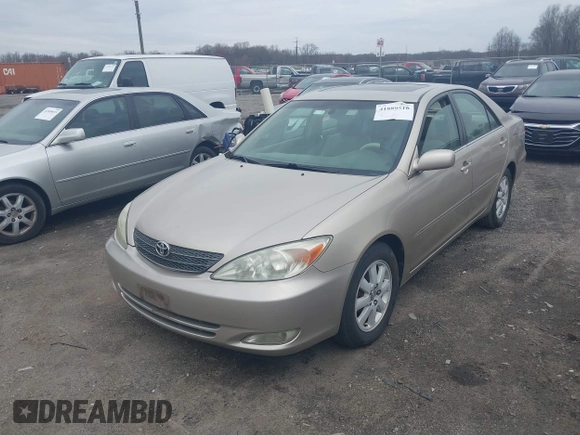 2003 Toyota Camry LE with VIN 4T1BE30K73U248560, listed as a IAAI auction lot 41889516 with 179,961 mi miles and . Bid and sale history available at DreamBid. Image 2.