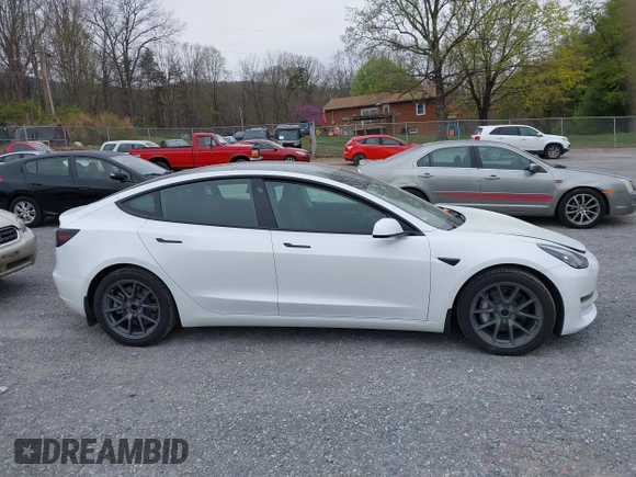 2021 Tesla Model 3 Long Range with VIN 5YJ3E1EBXMF980102, listed as a IAAI auction lot 41944364 with 48,766 mi miles and . Bid and sale history available at carsss.com. Image 13.