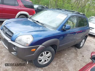 2006 Hyundai Tucson GLS with VIN KM8JN72D36U409525, listed as a IAAI auction lot 42082119 with 142,163 mi miles. Bid and sale history available at carsss.com. Image 2.