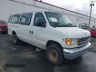 1997 Ford Econoline Wagon XL z VIN 1FBJS31L3VHB66356, wystawiony jako IAAI lot #39189974 z przebiegiem 242 944 mil mil oraz . Historia ofert i sprzedaży dostępna na DreamBid. Obrazek 1.
