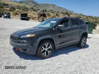 2016 Jeep Cherokee Trailhawk with VIN 1C4PJMBS8GW352316, listed as a Copart auction lot 62519365 with 128,576 mi miles and Salvage title. Bid and sale history available at DreamBid. Image 1.