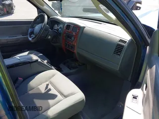 2005 Dodge Dakota SLT with VIN 1D7HW48N05S319621, listed as a IAAI auction lot 42037140 with 251,595 mi miles and . Bid and sale history available at DreamBid. Image 5.