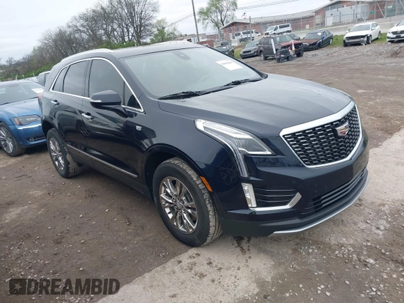 2021 Cadillac XT5 AWD Premium Luxury with VIN 1GYKNDRS6MZ147571, listed as a IAAI auction lot 41864286 with 46,144 mi miles. Bid and sale history available at carsss.com. Image 1.