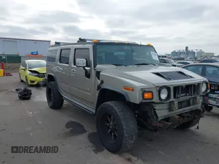 2003 Hummer H2 with VIN 5GRGN23U03H123344, listed as a IAAI auction lot 41093664 with 182,374 mi miles. Bid and sale history available at carsss.com. Image 1.