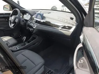 2021 BMW X1 sDrive28i with VIN WBXJG7C0XM5T45715, listed as a IAAI auction lot 42014499 with 23,793 mi miles and . Bid and sale history available at DreamBid. Image 5.