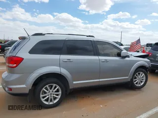 2018 Dodge Journey SXT z VIN 3C4PDCBB0JT361784, wystawiony jako IAAI lot #42172506 z przebiegiem 135 273 mil mil oraz . Historia ofert i sprzedaży dostępna na DreamBid. Obrazek 13.