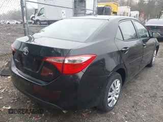 2015 Toyota Corolla L with VIN 2T1BURHEXFC292580, listed as a IAAI auction lot 41922364 with 165,143 mi miles and . Bid and sale history available at DreamBid. Image 4.
