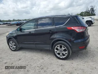 2013 Ford Escape SEL with VIN 1FMCU9H99DUD79003, listed as a Copart auction lot 51126005 with 104,151 mi miles and Clean Title. Bid and sale history available at DreamBid. Image 2.