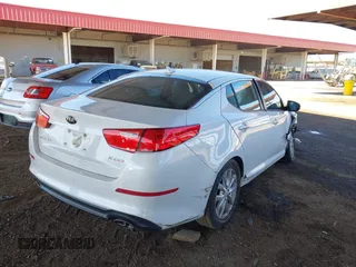 2014 Kia Optima EX z VIN 5XXGN4A74EG294124, wystawiony jako IAAI lot #41413272 z przebiegiem 154 058 mil mil oraz . Historia ofert i sprzedaży dostępna na DreamBid. Obrazek 4.