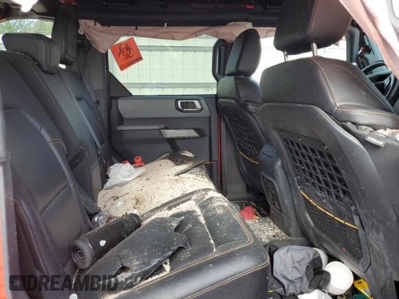 2023 Ford Bronco z VIN 1FMEE5DP6PLC01420, wystawiony jako Copart lot #52883195 z przebiegiem 11 620 mil mil oraz Szkoda całkowita • Salvage title. Historia ofert i sprzedaży dostępna na DreamBid. Obrazek 10.