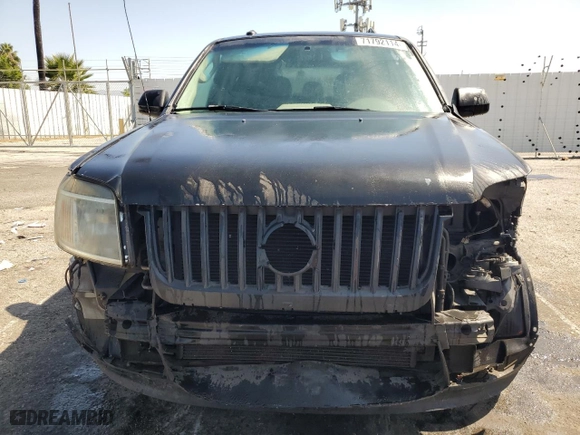 2010 Mercury Mariner Premier with VIN 4M2CN8H71AKJ24860, listed as a Copart auction lot 71792114 with 211,806 mi miles and Salvage Title. Bid and sale history available at carsss.com. Image 5.