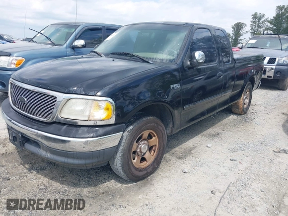 2000 Ford F-150 XL with VIN 1FTZX1723YNB84512, listed as a IAAI auction lot 41966003 with 1 mi miles. Bid and sale history available at carsss.com. Image 2.