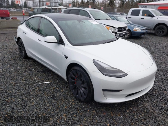 2023 Tesla Model 3 Performance z VIN 5YJ3E1EC9PF545648, wystawiony jako IAAI lot #41573583 z przebiegiem 15 207 mil mil oraz . Historia ofert i sprzedaży dostępna na DreamBid. Obrazek 1.