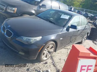 2009 BMW 5 Series 528i with VIN WBANU53569C118934, listed as a IAAI auction lot 41935178 with 208,848 mi miles and . Bid and sale history available at carsss.com. Image 2.