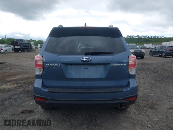 2018 Subaru Forester Touring with VIN JF2SJAWC5JH528330, listed as a IAAI auction lot 42344618 with 62,446 mi miles and . Bid and sale history available at DreamBid. Image 16.