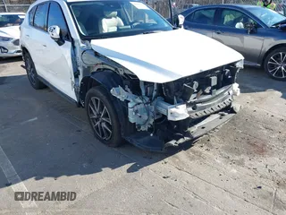 2018 Mazda CX-5 Grand Touring with VIN JM3KFBDM6J0435579, listed as a IAAI auction lot 41208899 with 131,212 mi miles. Bid and sale history available at carsss.com. Image 6.