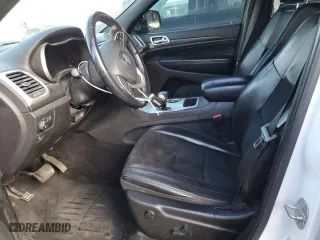 2015 Jeep Grand Cherokee Altitude with VIN 1C4RJFAG4FC954941, listed as a Copart auction lot 42010465 with 125,311 mi miles and Salvage Title. Bid and sale history available at carsss.com. Image 7.