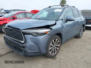 2022 Toyota Corolla Cross XLE with VIN 7MUDAABG6NV007009, listed as a IAAI auction lot 42409061 with 37,178 mi miles and . Bid and sale history available at DreamBid. Image 23.