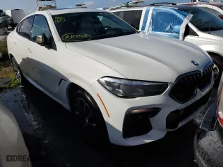 2022 BMW X6 M50i with VIN 5UXCY8C07N9K86690, listed as a Copart auction lot 74115254 with 0 mi miles and Salvage Title. Bid and sale history available at carsss.com. Image 4.