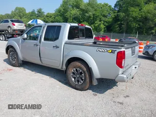 2018 Nissan Frontier SV with VIN 1N6AD0EVXJN743148, listed as a IAAI auction lot 42398810 with 82,286 mi miles and . Bid and sale history available at DreamBid. Image 3.