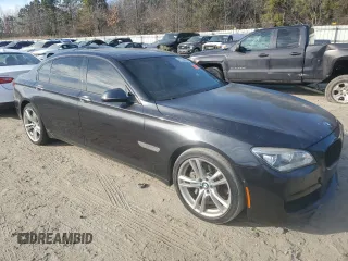 2015 BMW 7 Series 750Li with VIN WBAYE8C59FD780945, listed as a Copart auction lot 42730625 with 0 mi miles and Salvage Title. Bid and sale history available at carsss.com. Image 4.