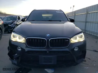 2015 BMW X5 M with VIN 5YMKT6C50F0C89135, listed as a Copart auction lot 84718754 with 105,963 mi miles and Salvage Title. Bid and sale history available at carsss.com. Image 5.