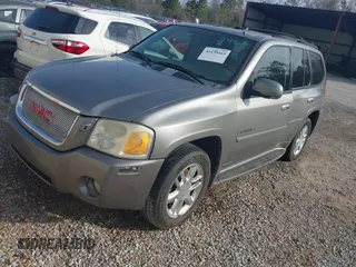 2006 GMC Envoy Denali with VIN 1GKES63MX62154590, listed as a IAAI auction lot 41439465 with 258,975 mi miles. Bid and sale history available at carsss.com. Image 2.