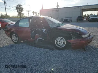 1999 Saturn SL z VIN 1G8ZK5278XZ173810, wystawiony jako Copart lot #42571425 z przebiegiem 114 580 mil mil oraz Szkoda całkowita • Salvage title. Historia ofert i sprzedaży dostępna na DreamBid. Obrazek 4.