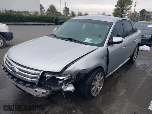 2009 Ford Taurus SEL with VIN 1FAHP24W39G102833, listed as a IAAI auction lot 40892334 with 288,418 mi miles. Bid and sale history available at carsss.com. Image 2.