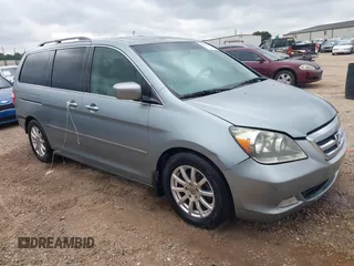 2005 Honda Odyssey Touring z VIN 5FNRL38805B120917, wystawiony jako IAAI lot #42396531 z przebiegiem 267 626 mil mil oraz . Historia ofert i sprzedaży dostępna na DreamBid. Obrazek 1.