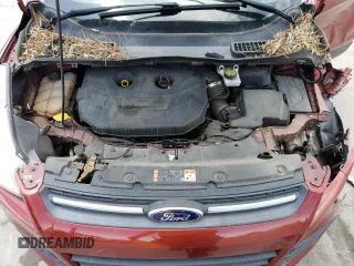 2016 Ford Escape SE z VIN 1FMCU9G9XGUC27074, wystawiony jako Copart lot #55788625 z przebiegiem 106 990 mil mil oraz Szkoda całkowita • Salvage title. Historia ofert i sprzedaży dostępna na DreamBid. Obrazek 12.
