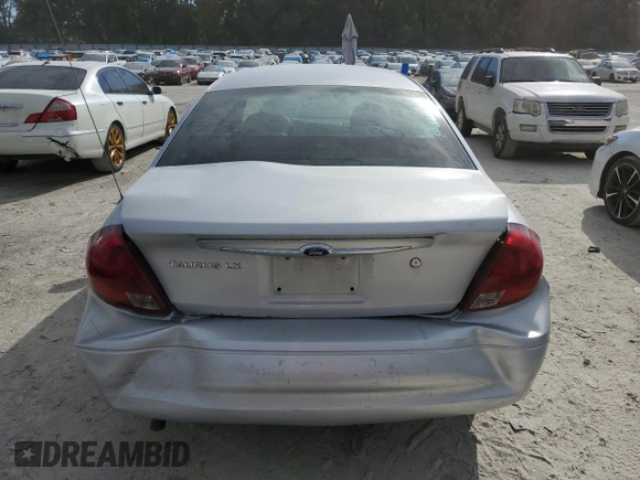 2003 Ford Taurus LX Standard z VIN 1FAFP52U43A110444, wystawiony jako Copart lot #83557764 z przebiegiem 118 897 mil mil oraz Szkoda całkowita • Salvage title. Historia ofert i sprzedaży dostępna na DreamBid. Obrazek 6.