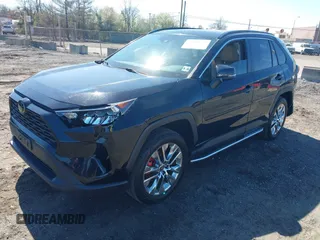 2021 Toyota RAV4 XLE Premium with VIN 2T3A1RFV6MC236809, listed as a IAAI auction lot 42056379 with 99,921 mi miles and . Bid and sale history available at DreamBid. Image 17.