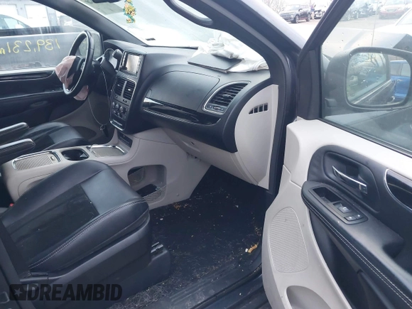 2014 Dodge Grand Caravan SXT with VIN 2C4RDGCG8ER257837, listed as a IAAI auction lot 41211629 with 139,231 mi miles and . Bid and sale history available at DreamBid. Image 5.