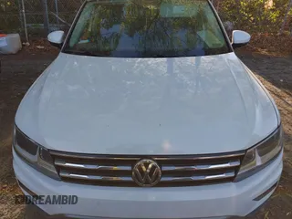2020 Volkswagen Tiguan S z VIN 3VV1B7AX5LM010741, wystawiony jako IAAI lot #42030616 z przebiegiem 104 533 mil mil oraz . Historia ofert i sprzedaży dostępna na DreamBid. Obrazek 12.